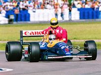 1991 British Grand Prix winner Nigel Mansell in Williams FW14-5 gives Ayrton Senna a lift back to the pits after the latter ran out of fuel on the final lap. Courtesy of Motorsport Images